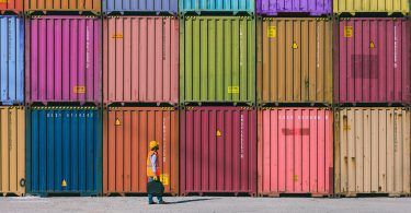 Maintanence worker working with cargo containers