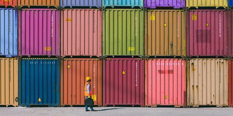 Maintanence worker working with cargo containers